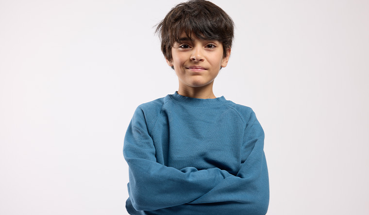 Boy with crossed arms
