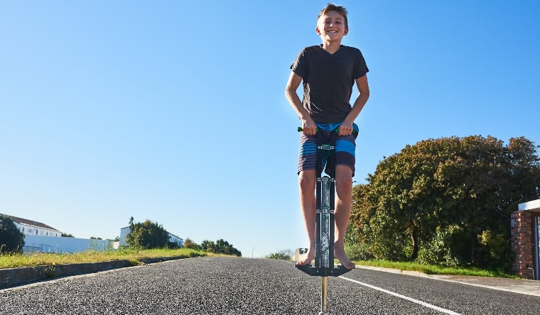 boy on a pogo stick
