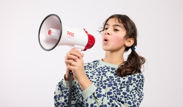 Girl shouting through speaker
