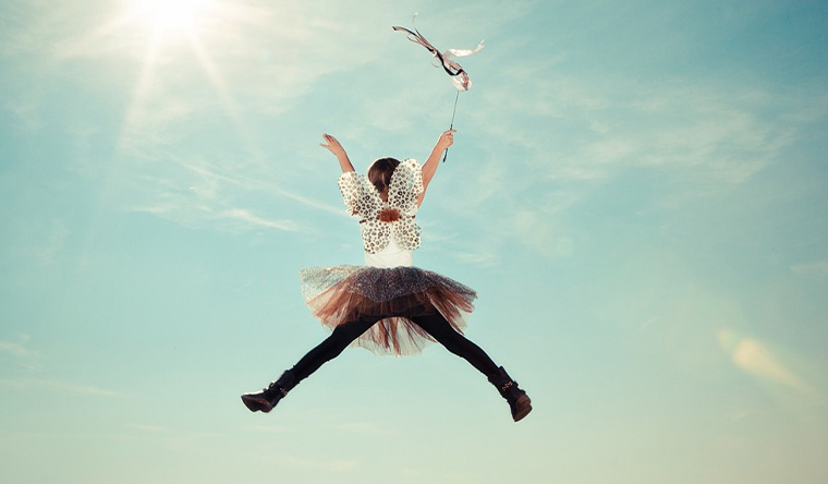 Girl doing a start jump in the air