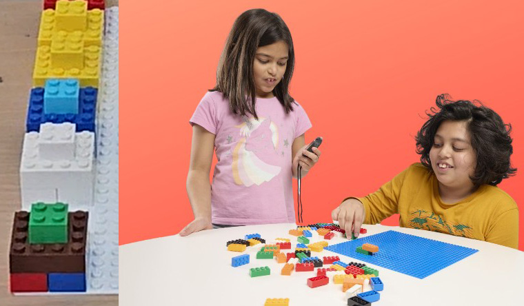 Two girls playing with Lego® bricks