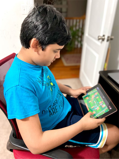 Abhimanyu Mishra playing chess online on ipad