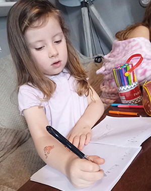 Bella writing her first book