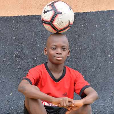 Chinonso Eche balancing football on his head