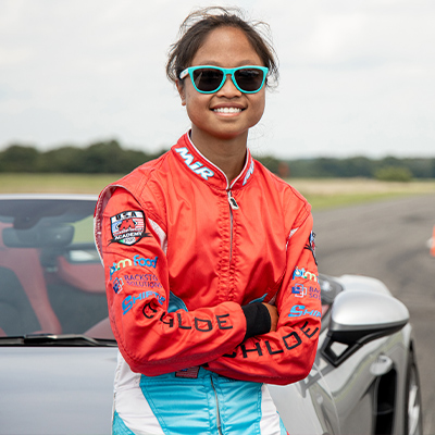 Chloe Chambers smiling in red jacket