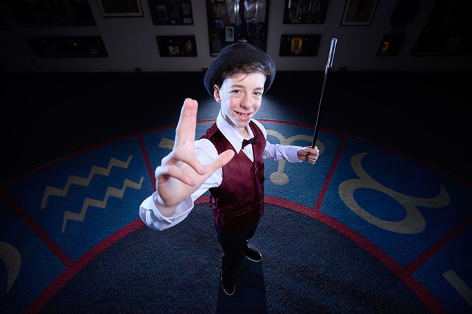 Cillian smiling with magic wand