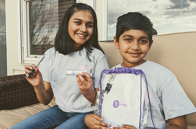 gitanjali posing with boy at the kindly app launch