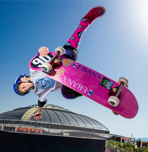 gui on pink skateboard