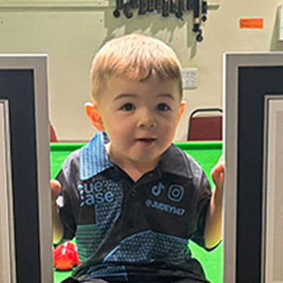jude holding two certificates