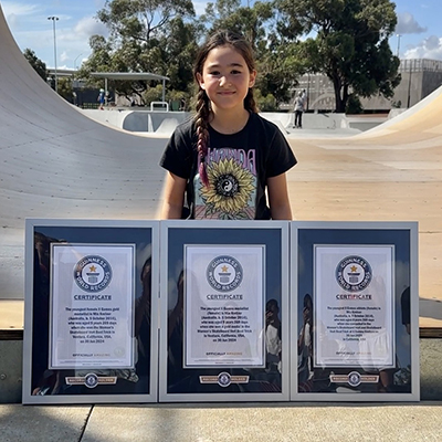 Mia Kretzer with her three framed GWR certificates