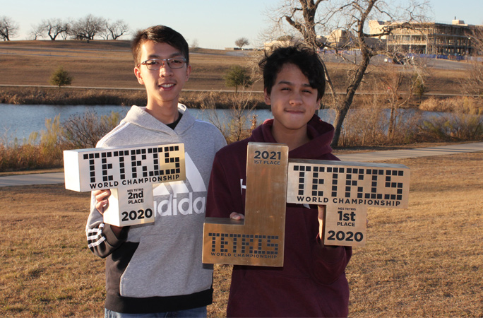 michael and his brother with tetris trophies