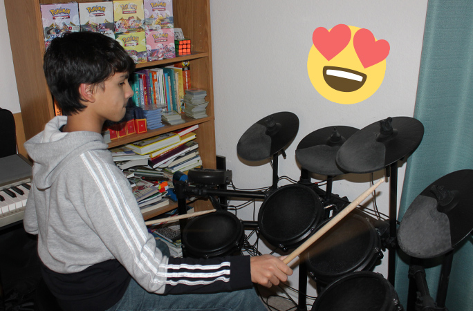 michael playing his drum set