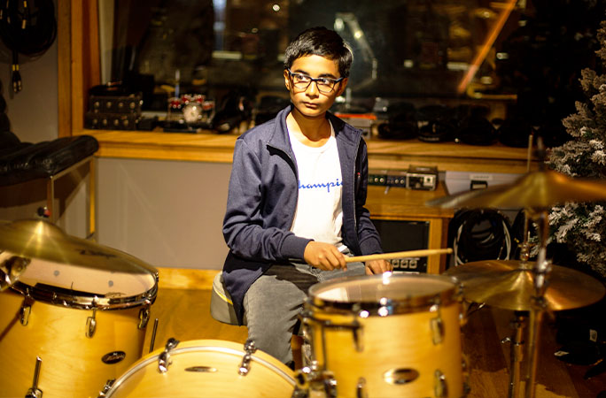 Pritish palying the drums