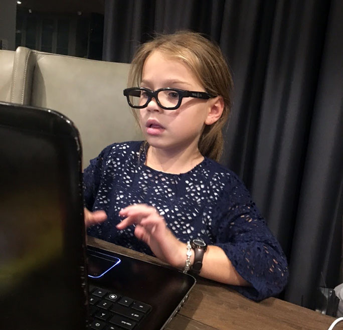 roxy typing on laptop
