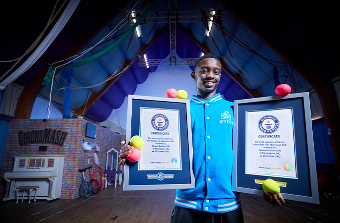Simeon holding to Record certificates