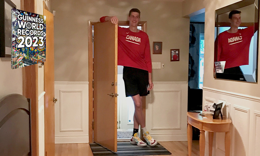 olivier standing next to doorway in his home