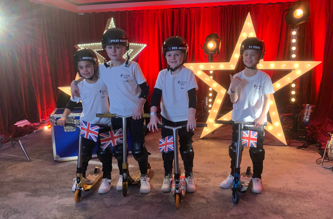 tyler with other boys at britains got talent