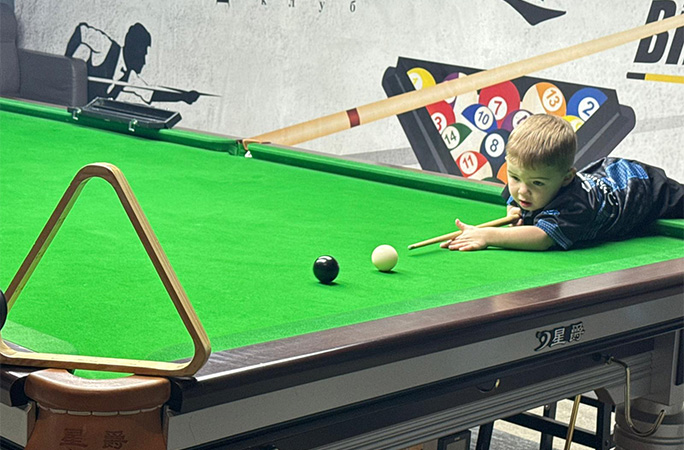 Jude playing snooker
