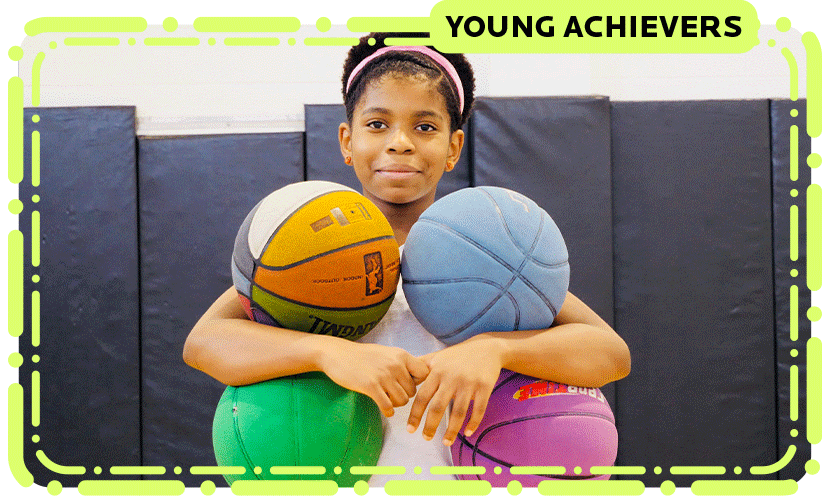 zaila holding 4 different coloured basketballs