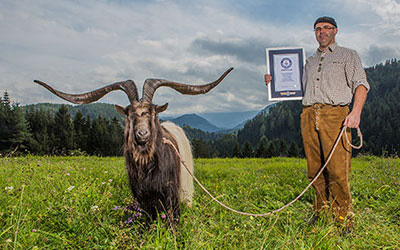 rasputin next to man holding his GWR certificate